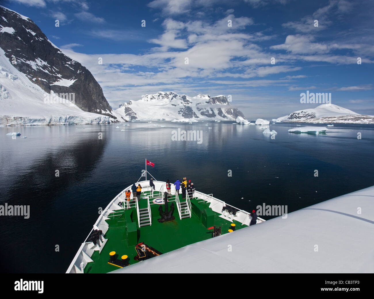 MS Expedition sailing towards the Lemaire Channel, Antarctic Peninsula Stock Photo