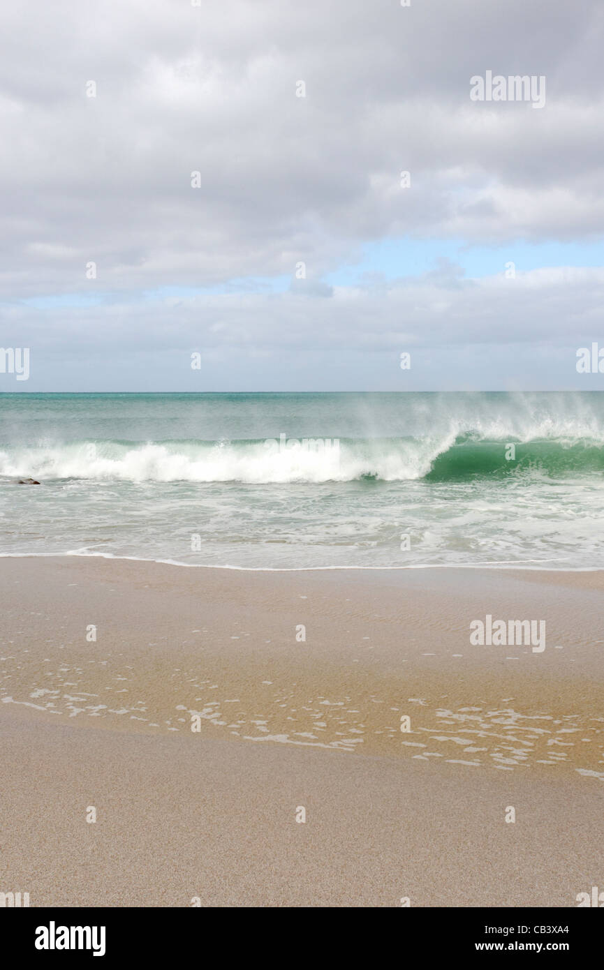Waves breaking on shore at Wineglass Bay, Freycinet National Park, East Coast, Tasmania, Australia Stock Photo
