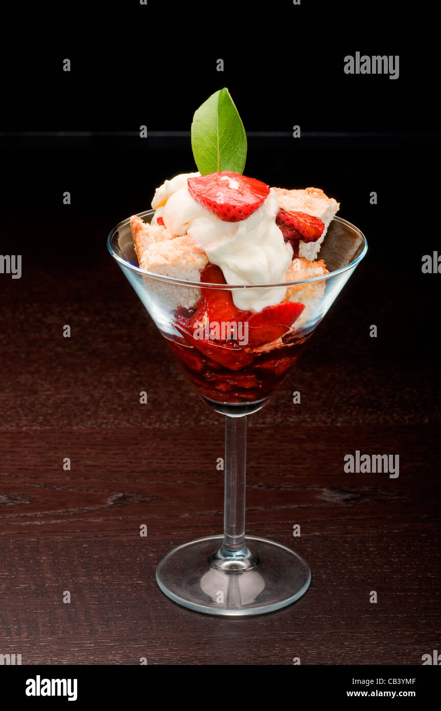 Close-up of strawberry shortcake in a martini glass Stock Photo - Alamy