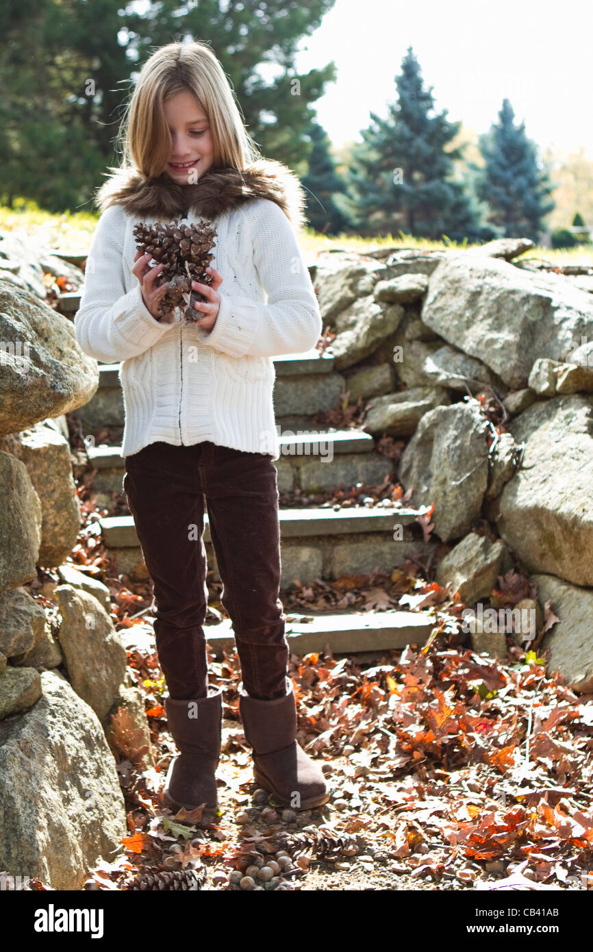 Girl 10 11 years holding leaf hi-res stock photography and images - Alamy
