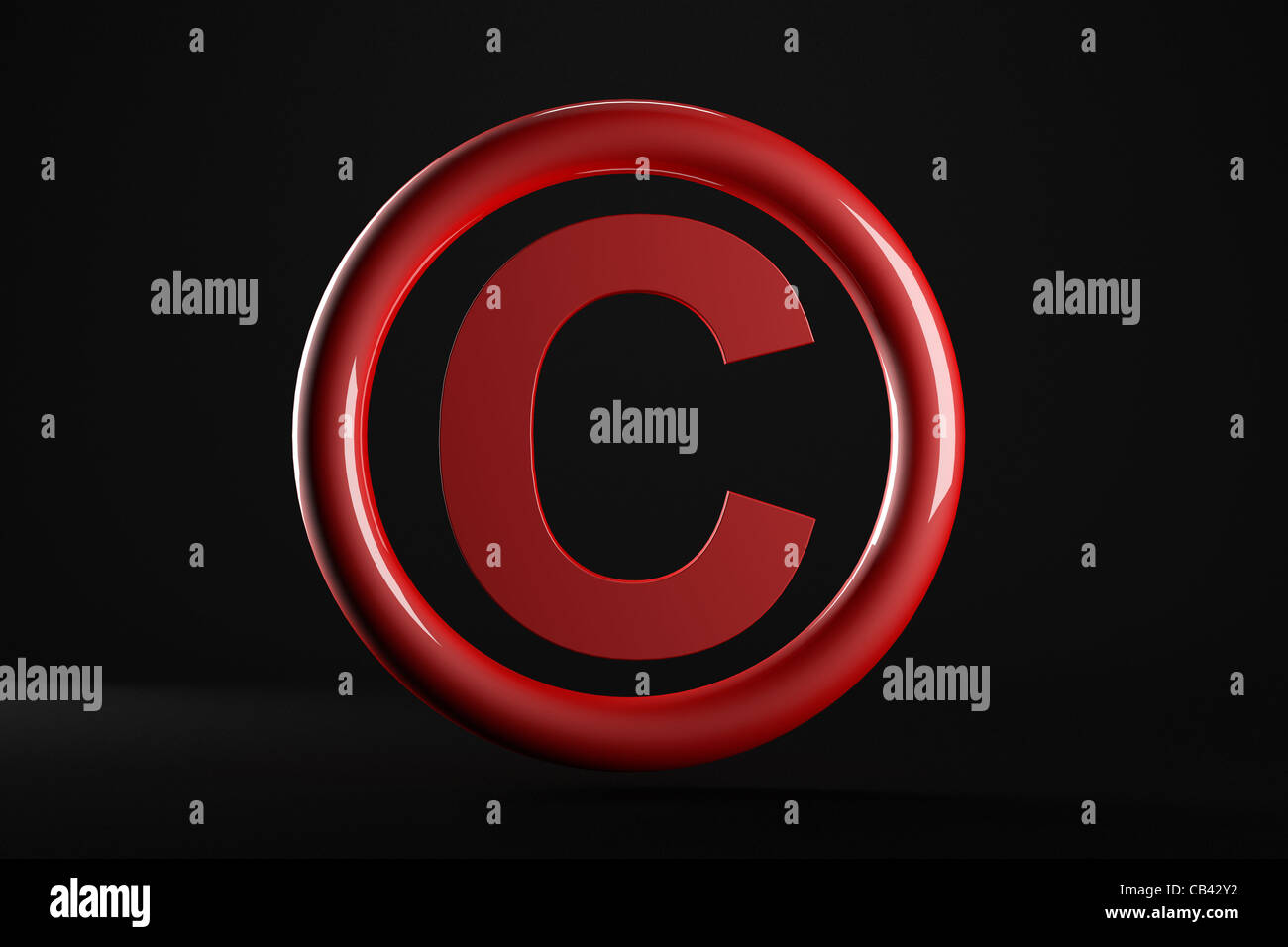 Red copyright symbol 3d rendered in a dark background Stock Photo