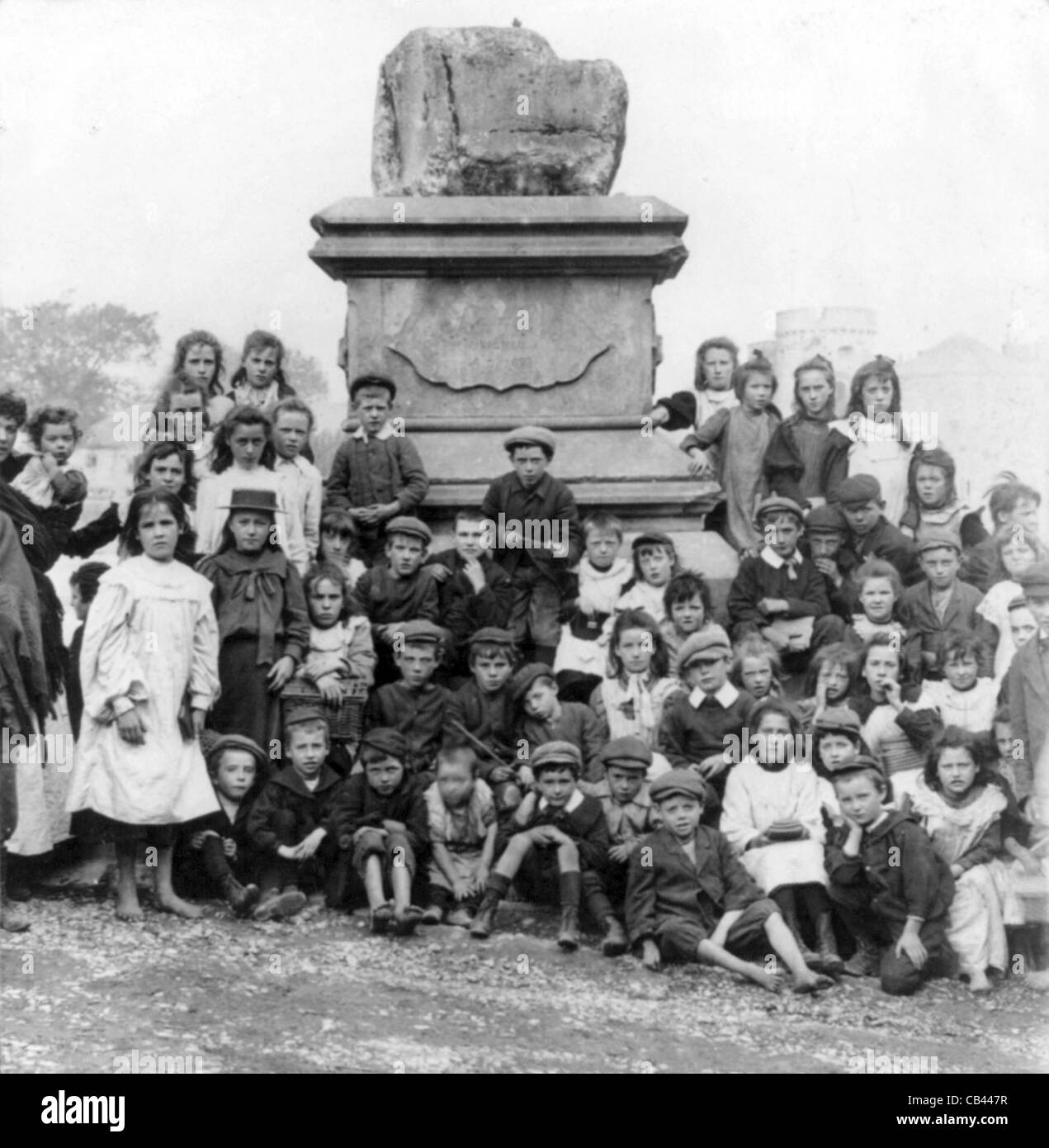 Limerick boys and girls by famous Treaty Stone of 1691, Ireland Stock Photo