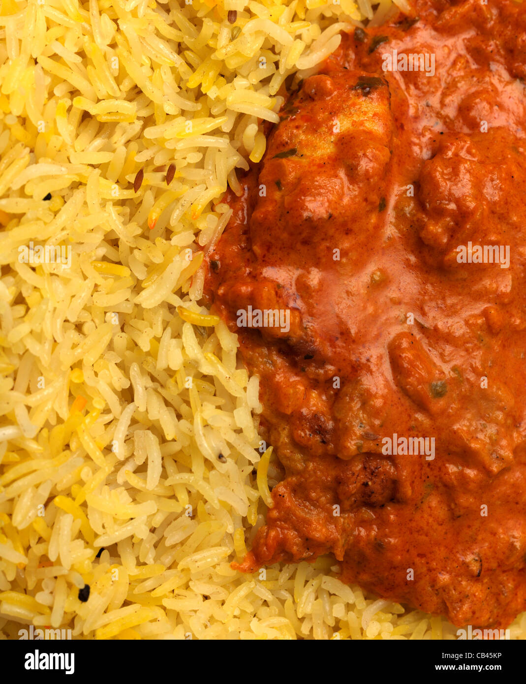 Chicken Tikka Masala And Pilau Rice Stock Photo