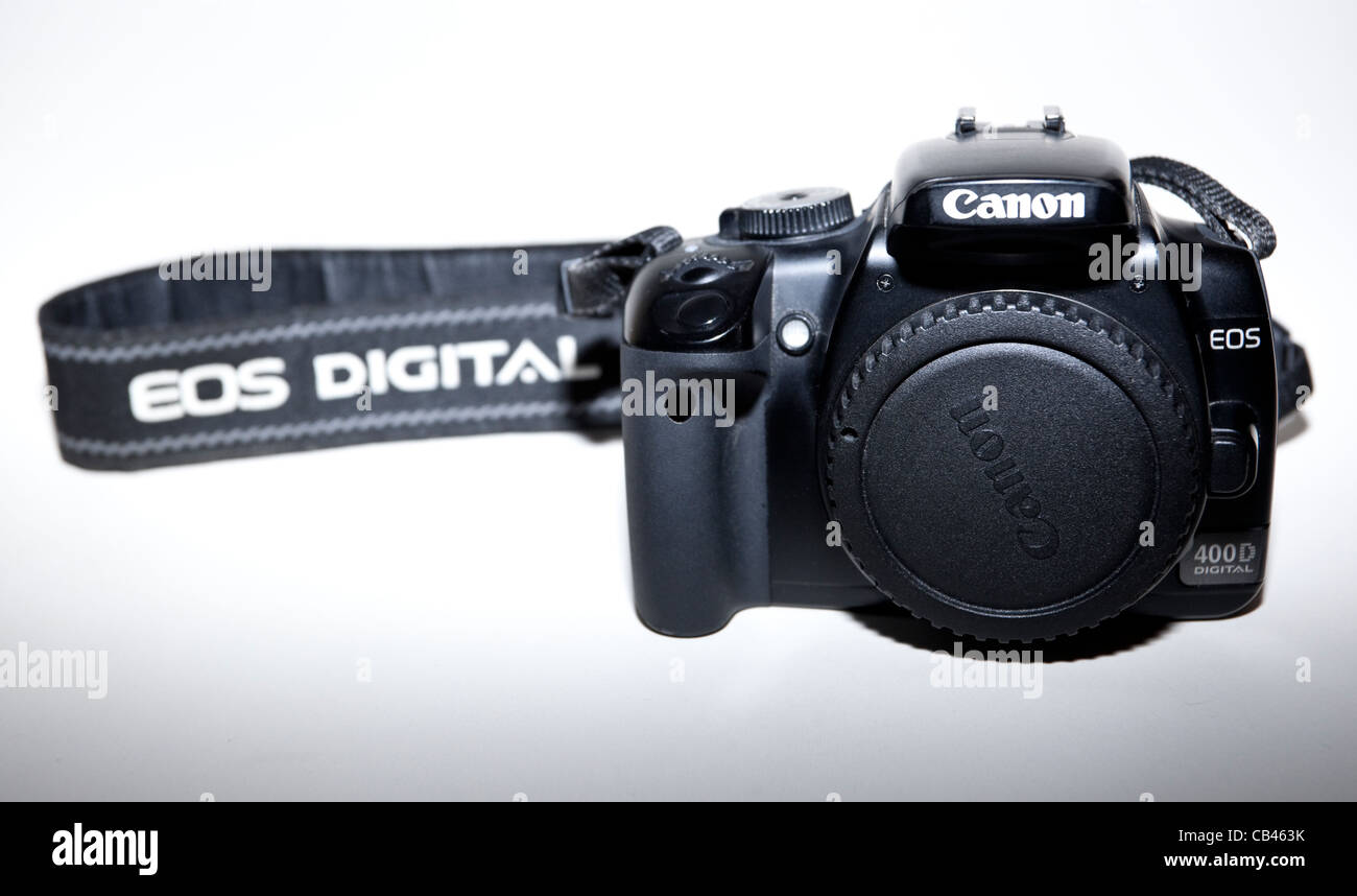 An isolated Canon 400D digital camera on white background. Stock Photo
