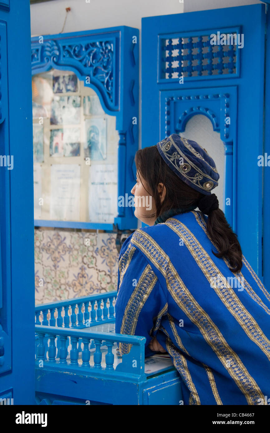 Arab girl in traditional dress, Dar el Annabi house, Sidi bou Said near Tunis Tunisia Stock Photo
