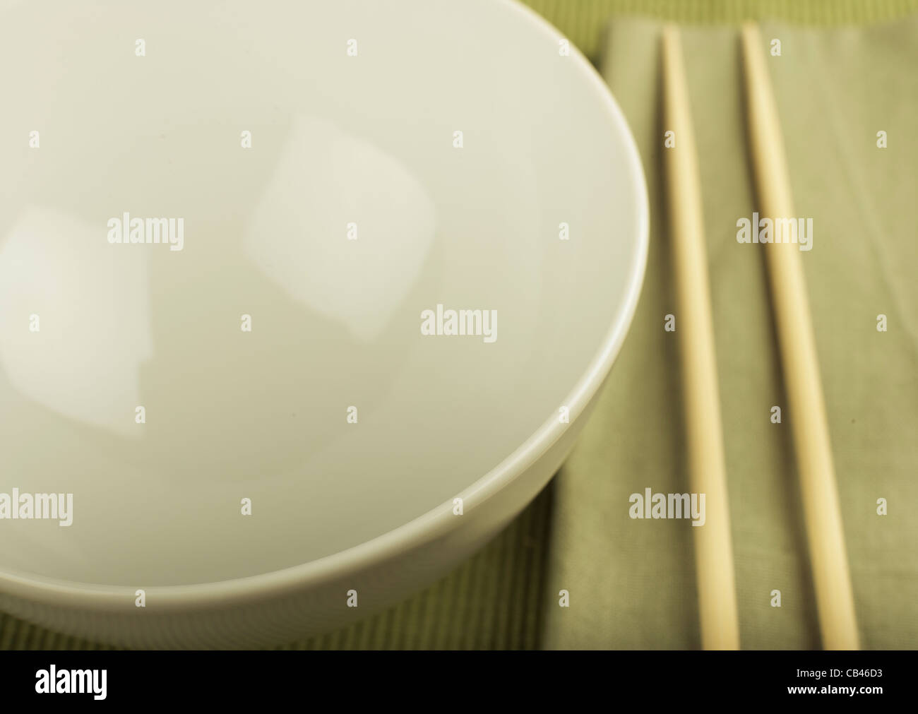 Bowl and chopsticks at place setting Stock Photo Alamy