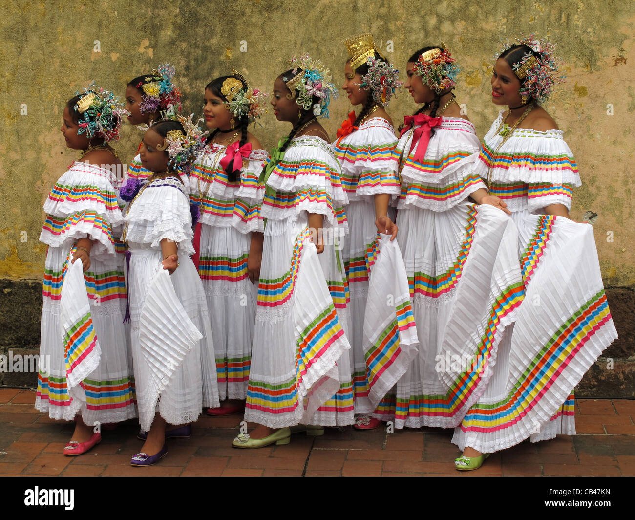 Panamanian girls wearing the pollera tireada, a panamanian typical costume, at the Panama city old town. Stock Photo