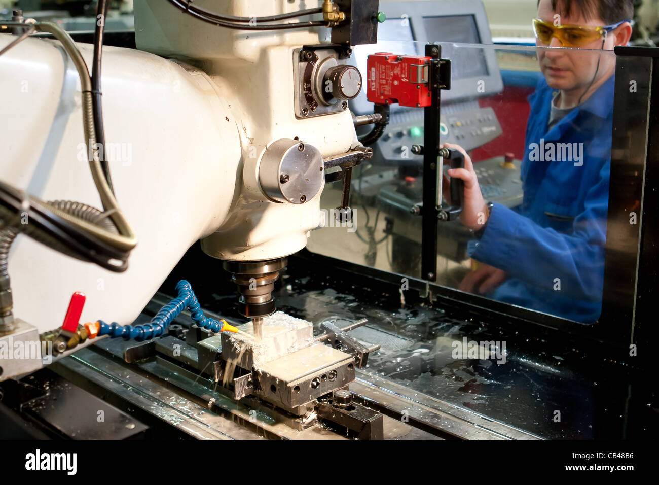 Engineering technician, Engineer working a CNC milling machine with