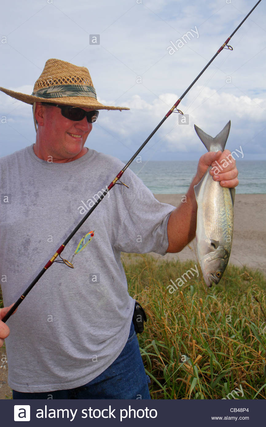 Florida Juno Beach Atlantic Ocean Coast Shore Man Fisherman Catch