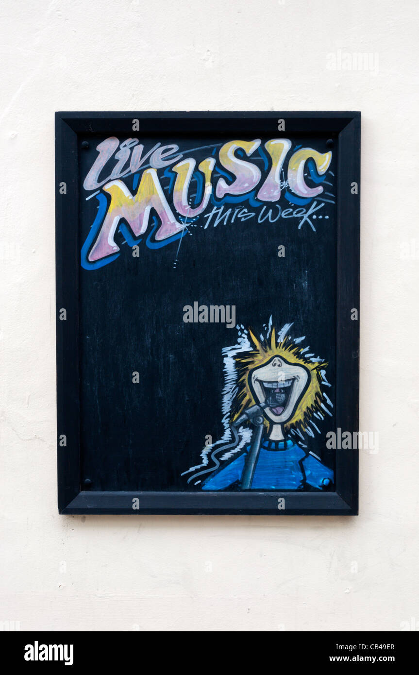 A sign outside a public house for displaying the names of Live Music acts that will be performing Stock Photo
