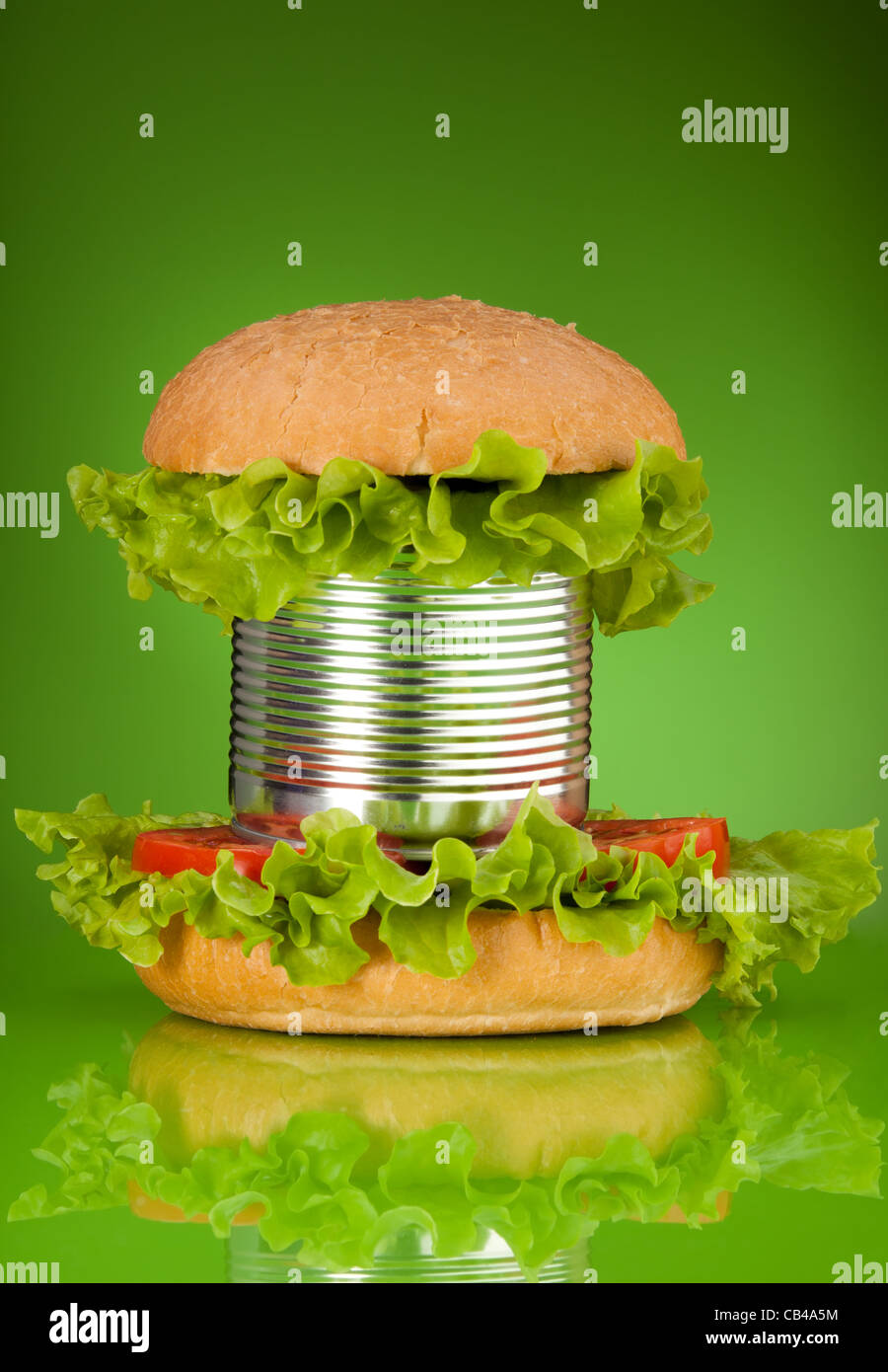 Unhealthy canned fast food hamburger depicting concept of a lot of