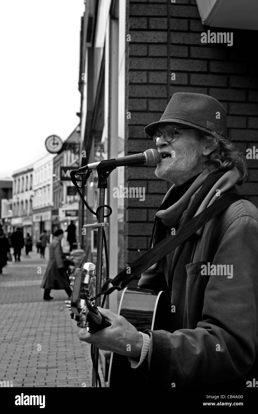 Busker money hat hi-res stock photography and images - Alamy