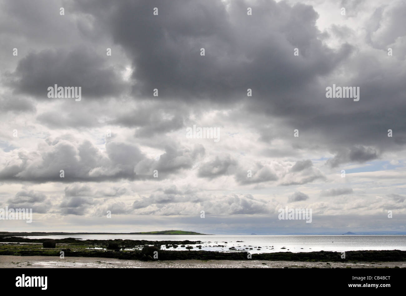 The sandy beach at Lower Largo in the East Neuk of Fife, Scotland with dramatic sky. Stock Photo