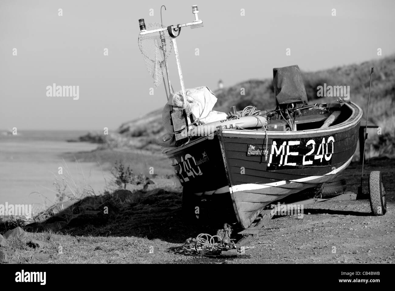 Small white fishing boats Black and White Stock Photos & Images - Alamy