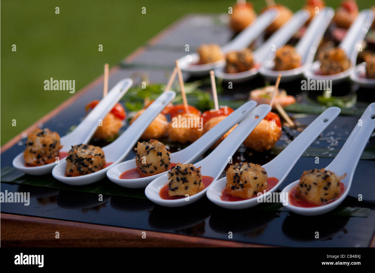 London, UK, 25/08/2011, Chicken croquettes in red sauce during a