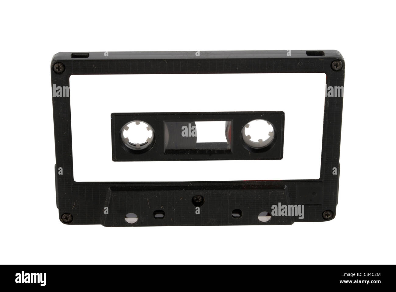Single black audio cassette and label isolated on white background. Included clipping path for each part, so you can easily cut it out and place over the top of a design. Stock Photo