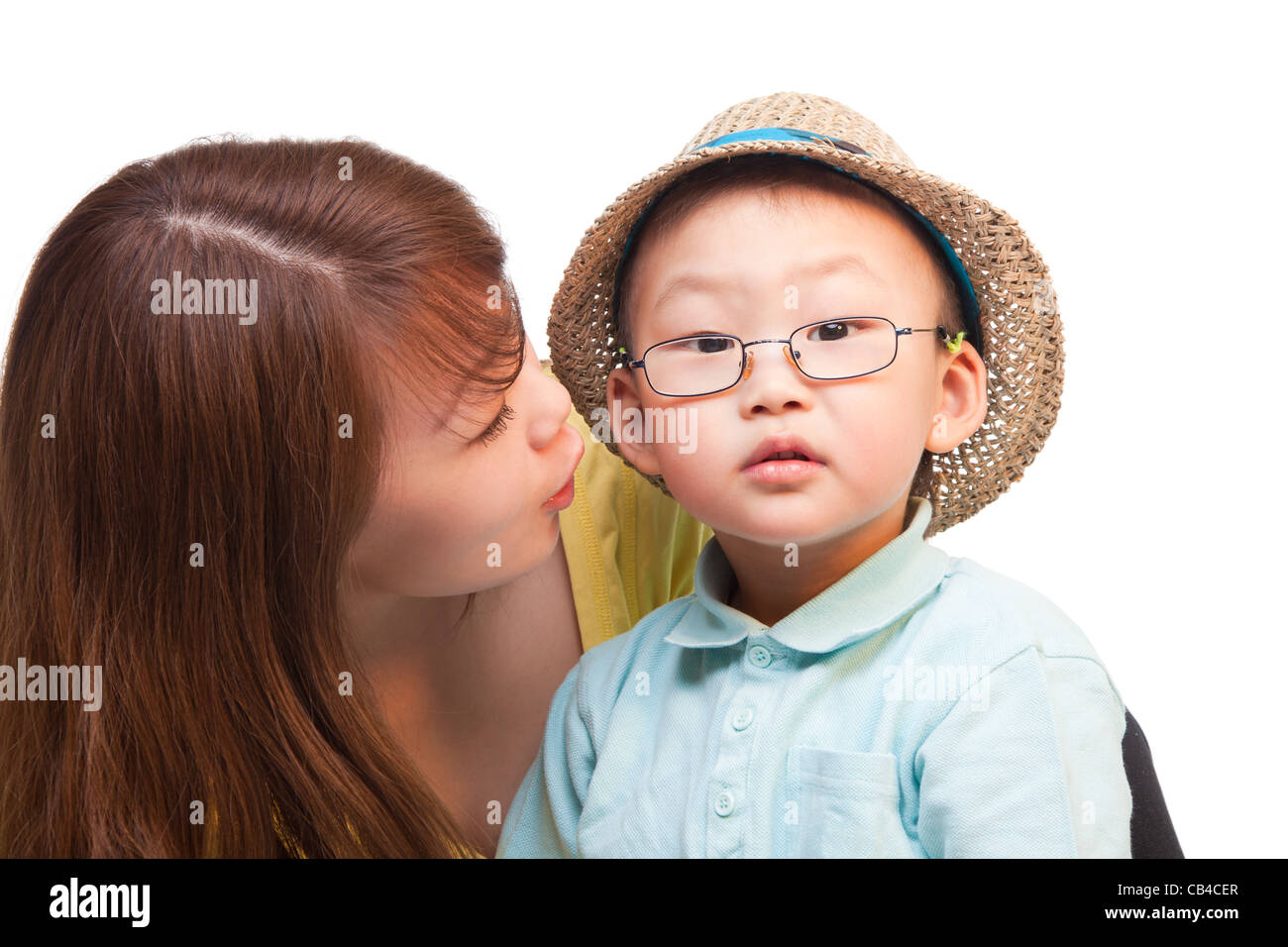 Chinese mother and kid in traveler hat, together, isolated on whtie Stock Photo