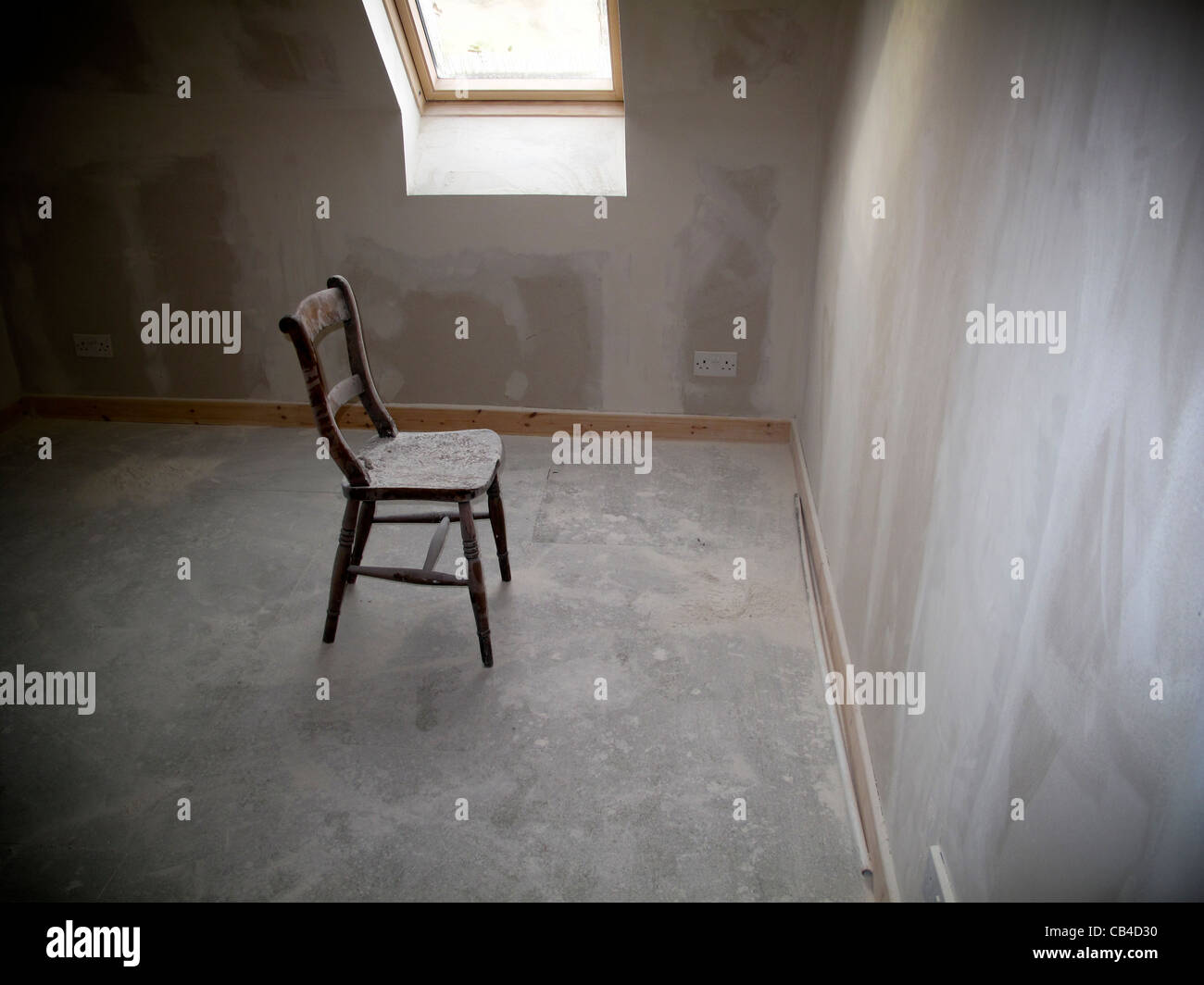 empty wooden chair in empty room Stock Photo