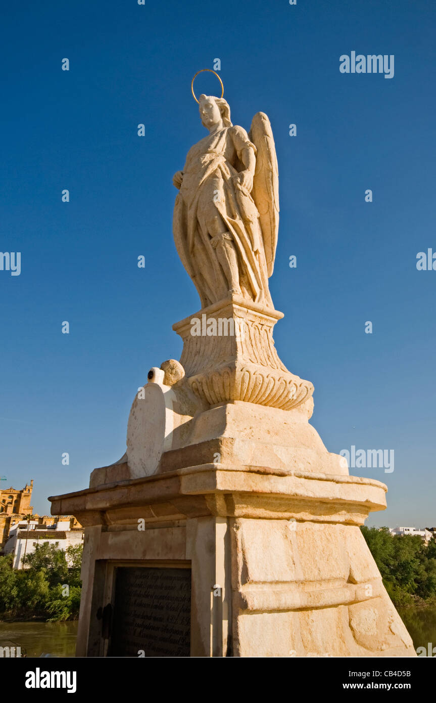 EUROPE SPAIN Cordoba Roman Bridge (Puente Romano) Statue of Saint Raphael from 1651 Stock Photo