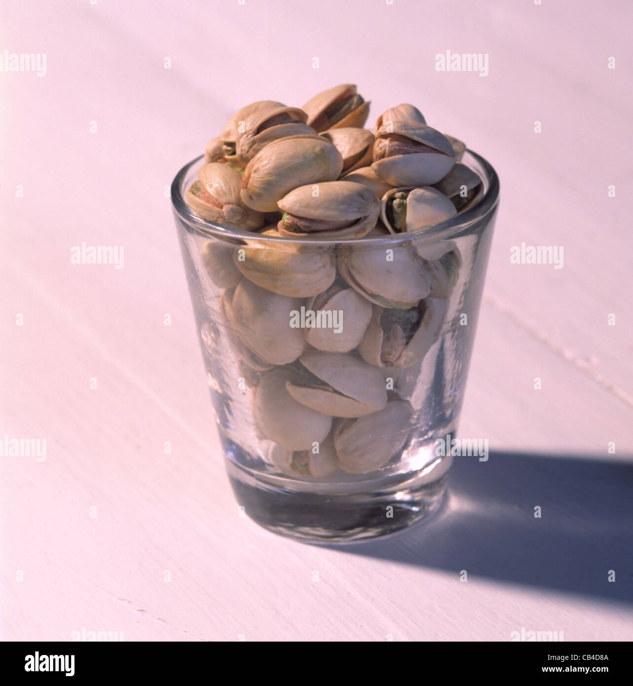 Cut out pistachios in glass Stock Photo Alamy