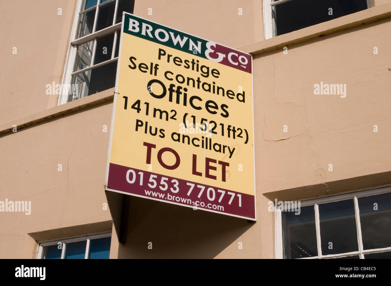 office to rent business premises to let sign empty vacant Stock Photo