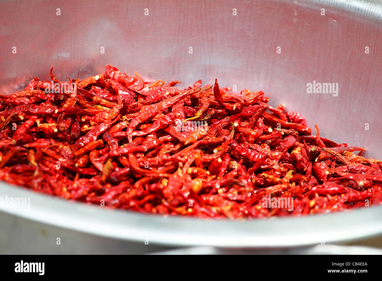 Chili peppers drying in the sun in Thailand Stock Photo - Alamy