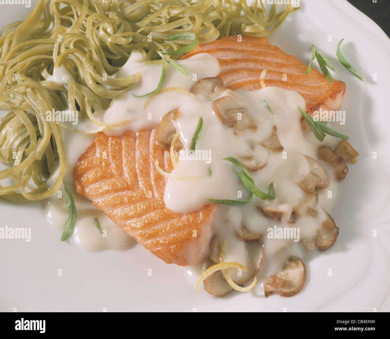 Salmon filet in tarragon sauce Stock Photo Alamy