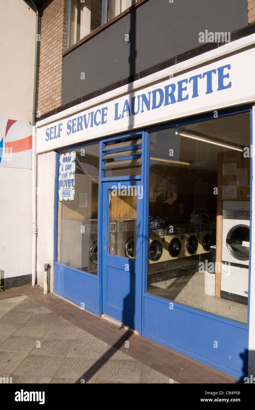 launderette self service washing machine machines clean clothes coin operated Stock Photo Alamy
