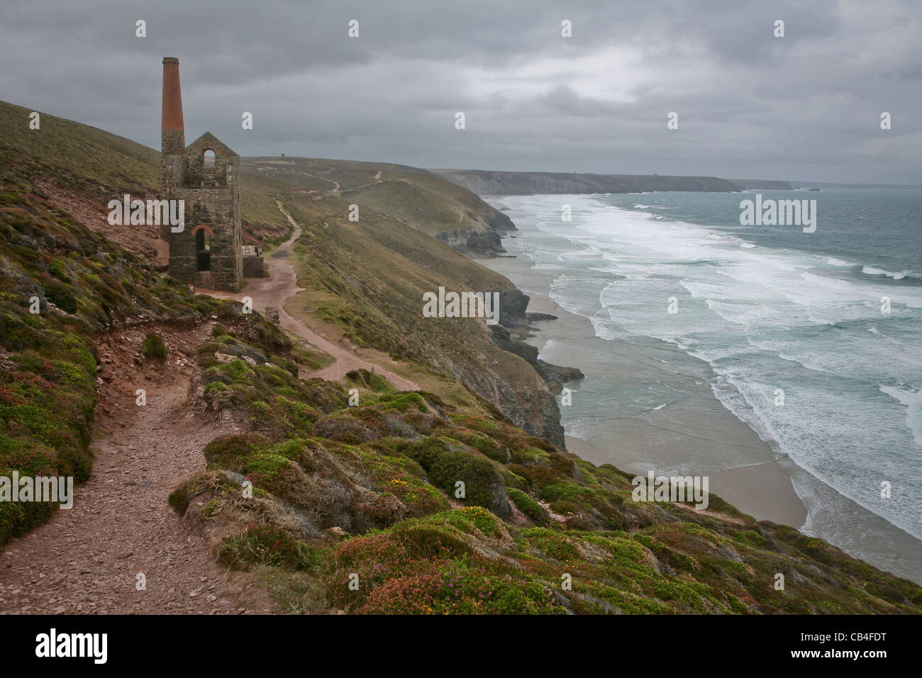 Coastal walk along the cliffs by the Wheal Coates Tin Mine, Chapel Porth on a stormy day. Stock Photo