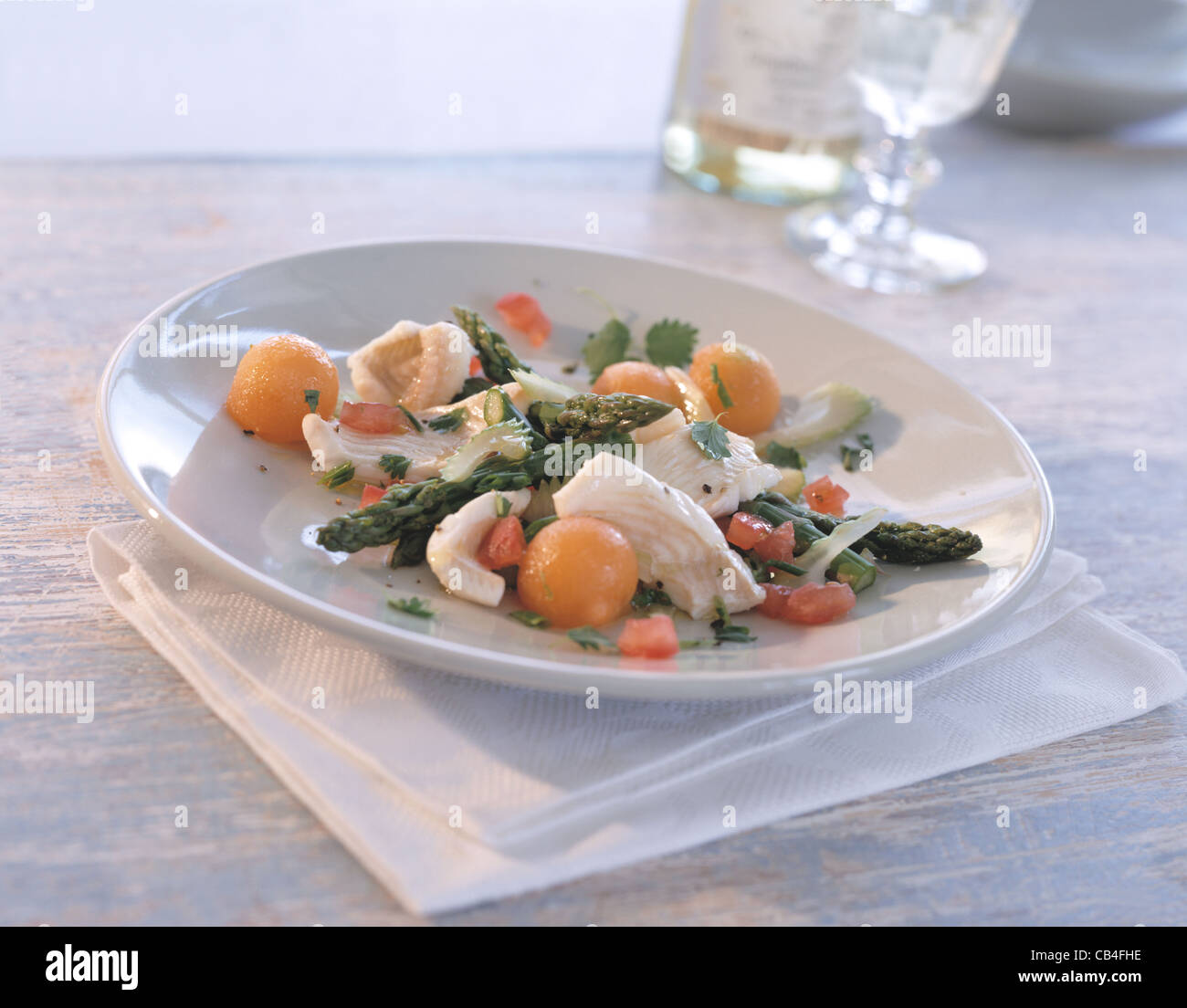 Salad of fish fillet with green asparagus Stock Photo