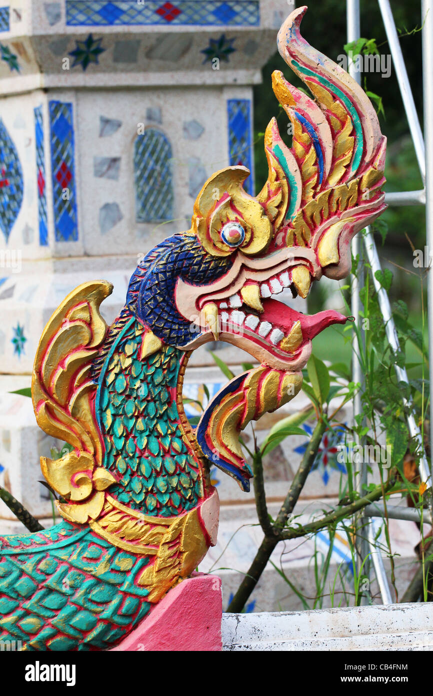 Naga statue in a temple grounds in a village in Issan, Thailand. Stock Photo