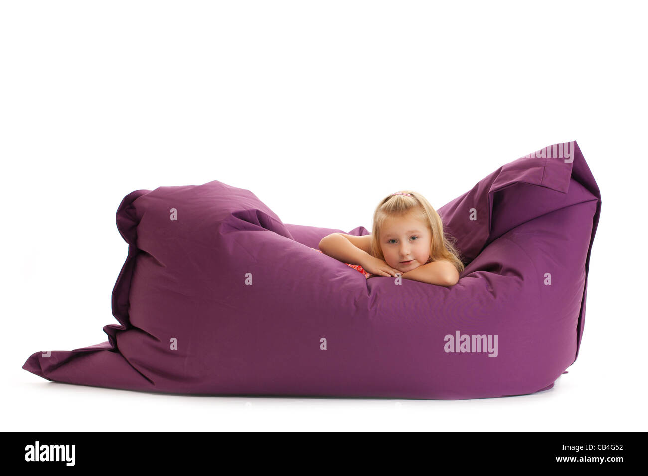 the little girl posing on beanbag Stock Photo - Alamy