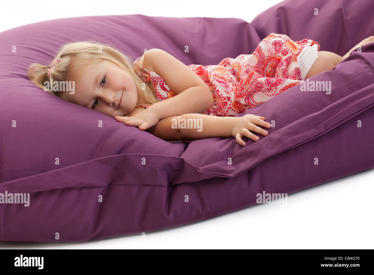 the little girl posing on beanbag Stock Photo - Alamy