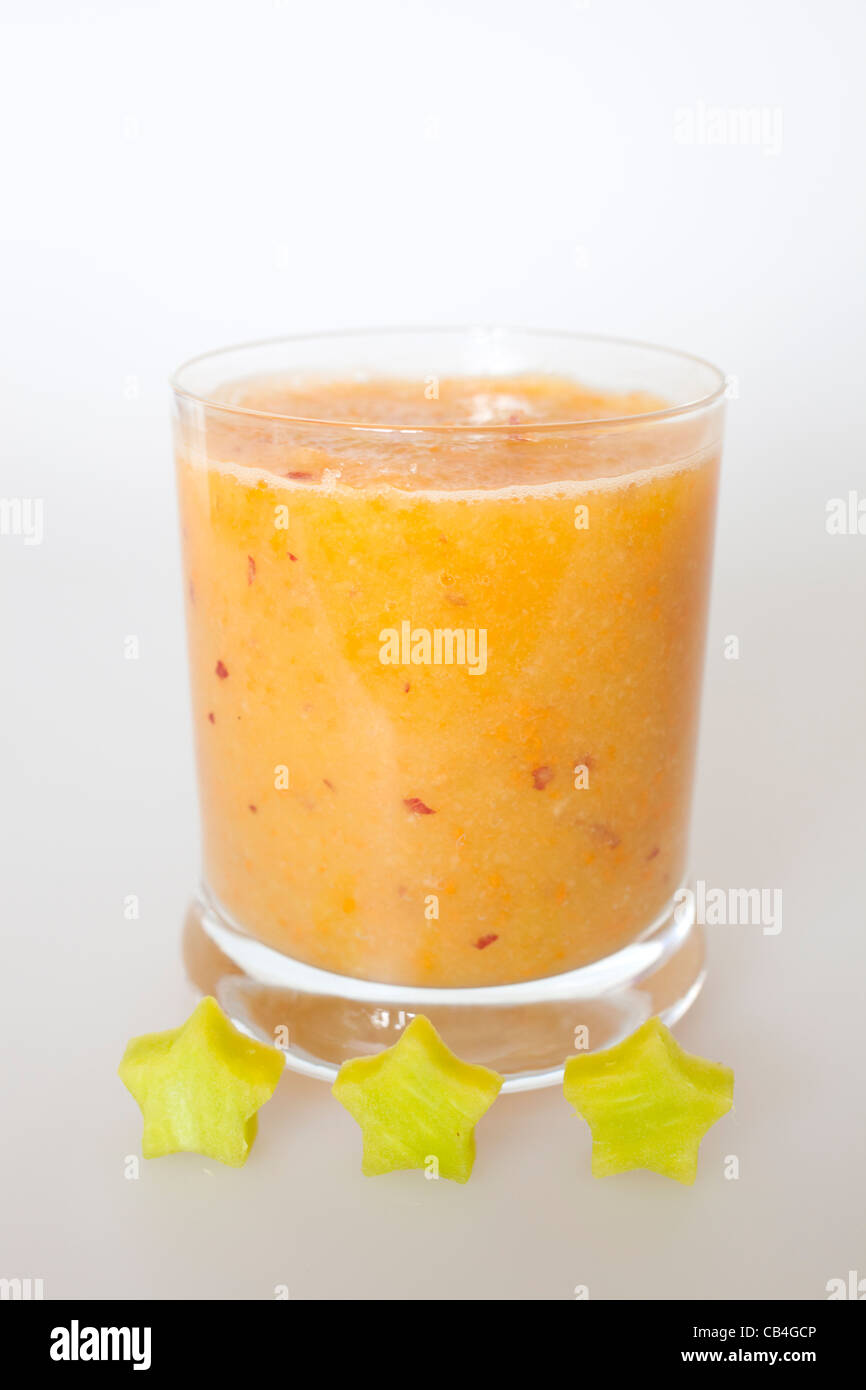glass with blended fruits decorated with the stars Stock Photo