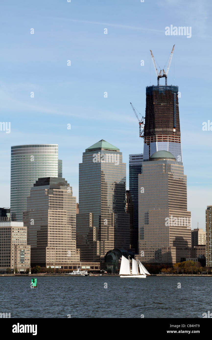 The Freedom Tower under construction and rising from Ground Zero, the scene of the 9/11 terrorist attack. Stock Photo