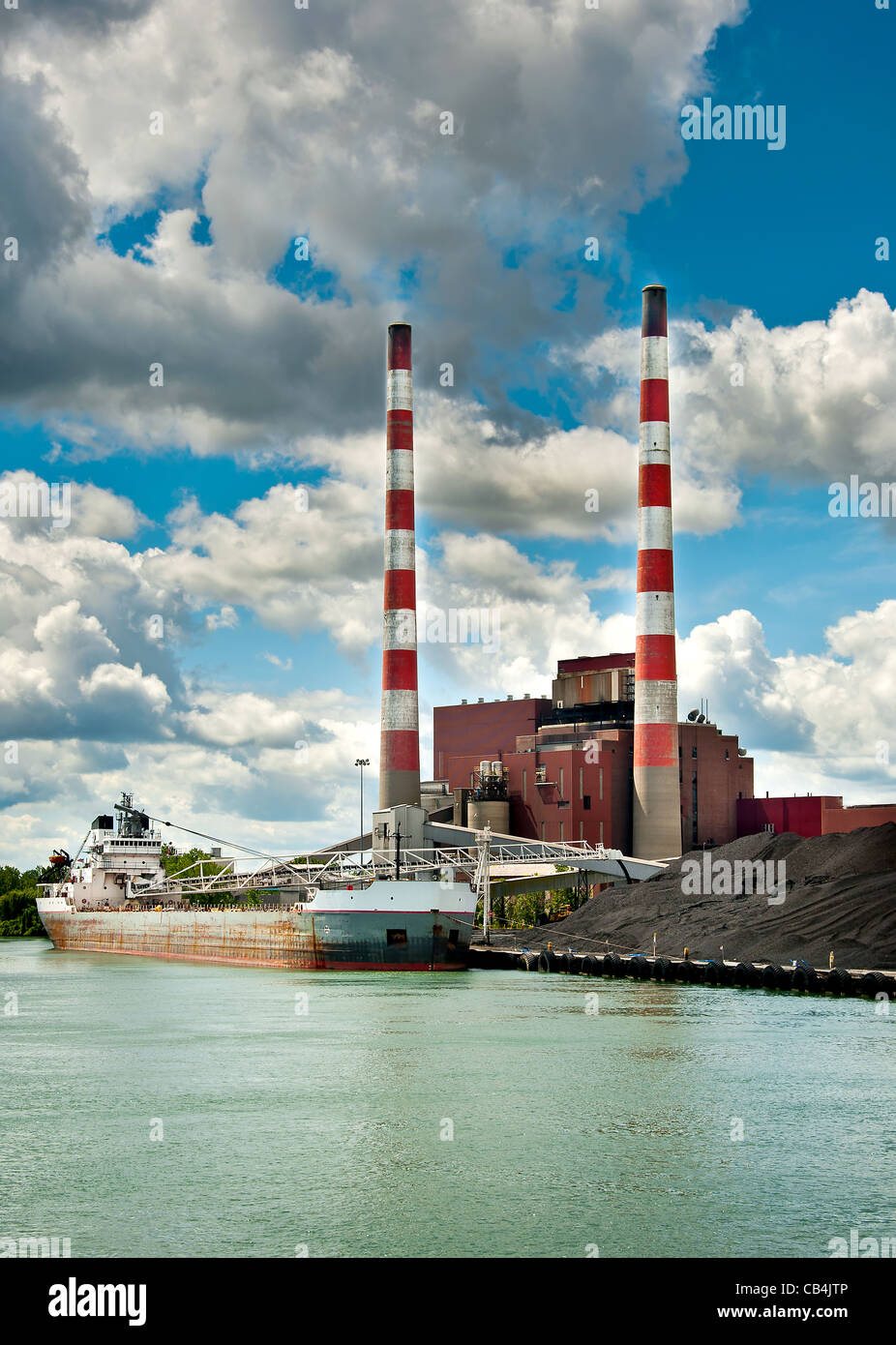 Coal Ship at Power Plant Stock Photo