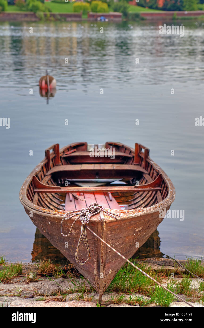 boat-on-the-river-ticino-at-sesto-calende-lombardy-italy-stock-photo