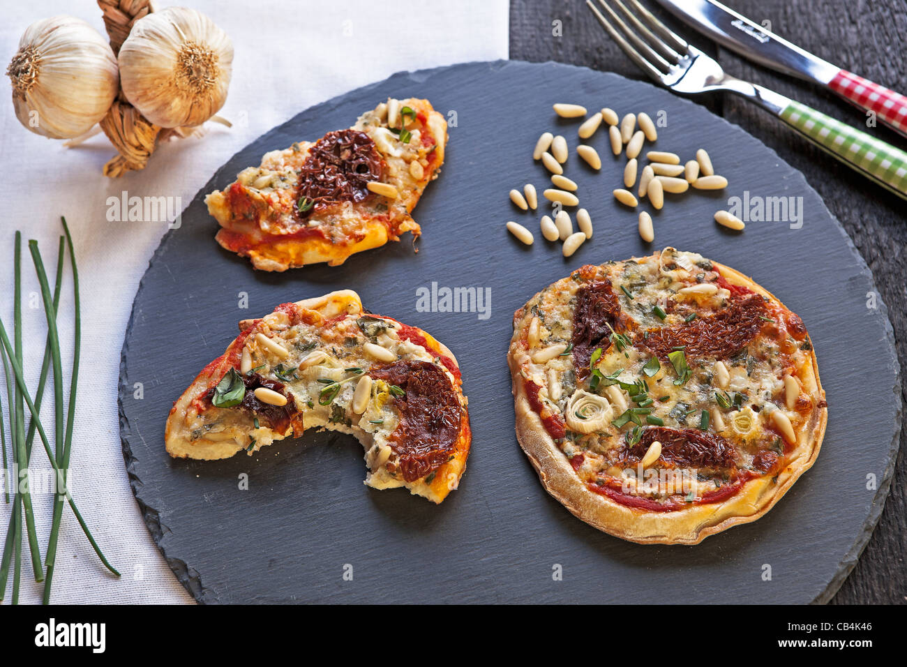 Pizza Topped With Cottage Cheese And Herbs Into Stock Photos