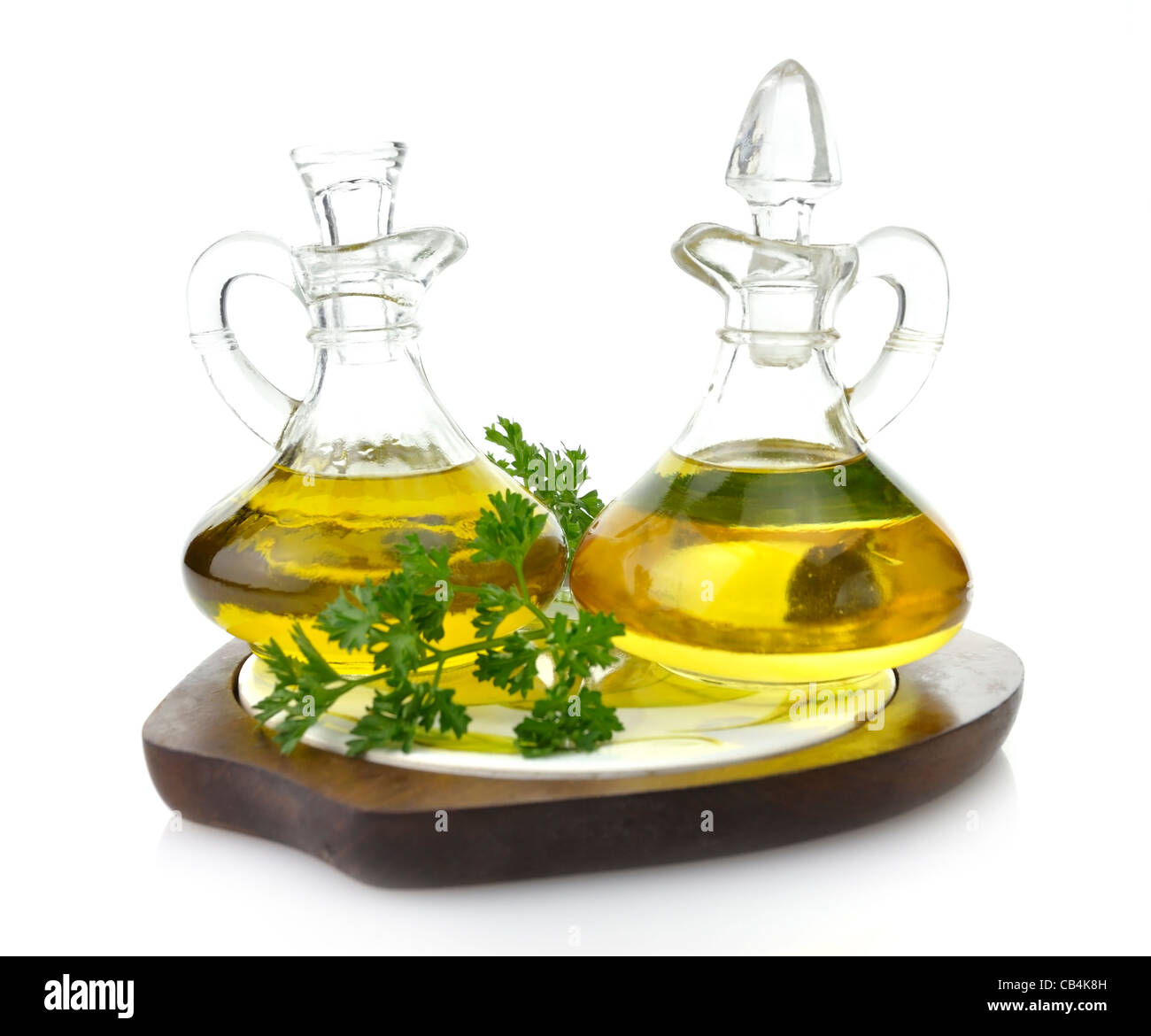 Cooking Oil Glass Bottles On Wooden Board Stock Photo Alamy