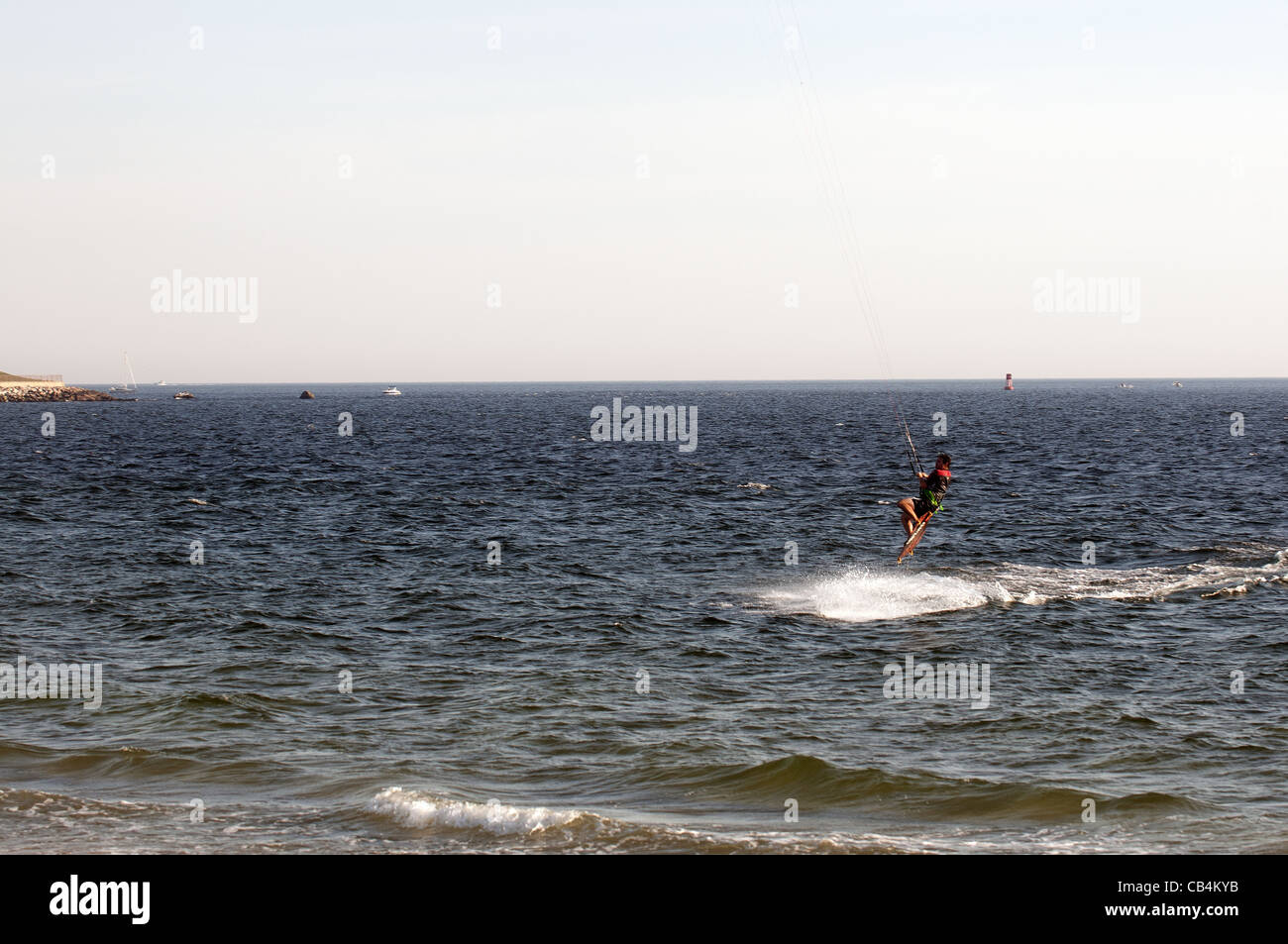 kiteboarder off of Nappatree in Watch Hill Rhode Island Stock Photo