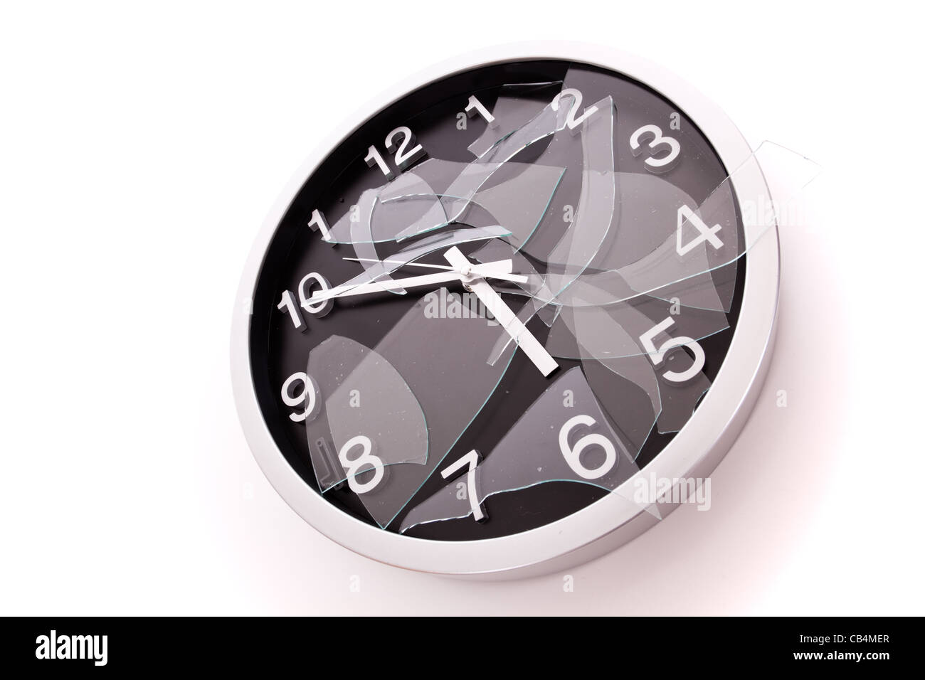 broken wall clock over a white background Stock Photo Alamy