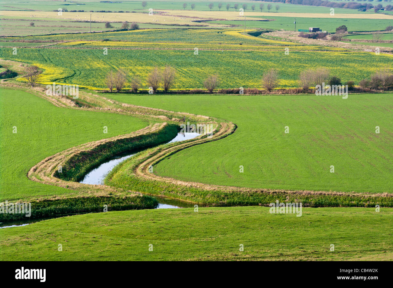 View Across The East Sussex Countryside From Winchelsea UK country rural Landscape with stream streams Stock Photo