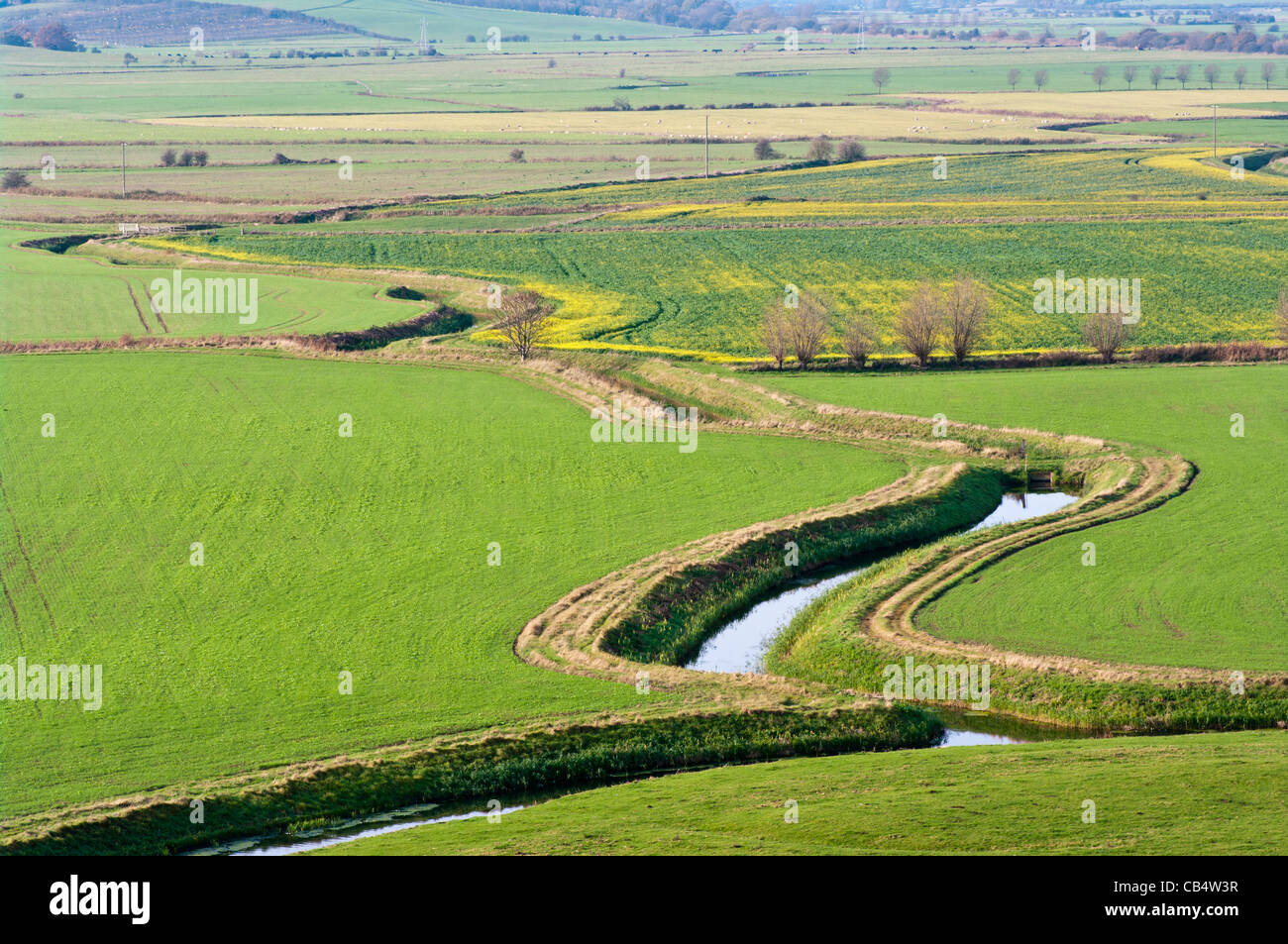 View Across The East Sussex Countryside From Winchelsea UK country rural Landscape with stream streams Stock Photo