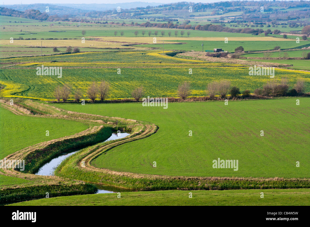View Across The East Sussex Countryside From Winchelsea UK country rural Landscape with stream streams Stock Photo