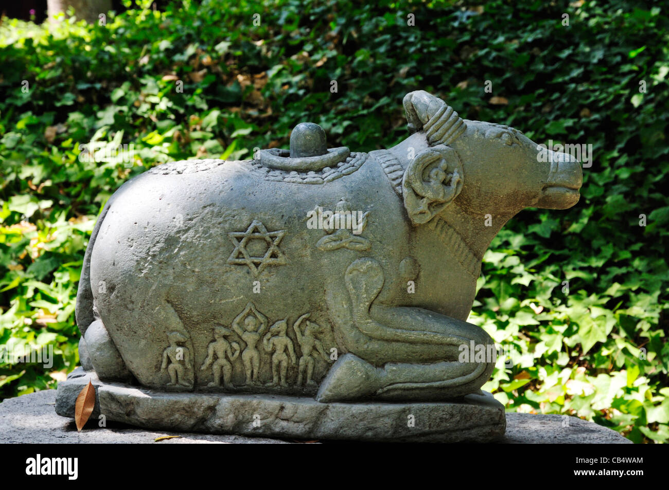 Carved bull with Shiva lingam (symbol of Shiva) and other images including star of David at the Norton Simon museum in Pasadena Stock Photo
