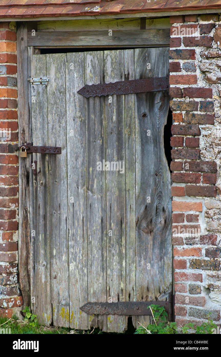 Old Wooden Wood Rustic Door Locked With A Padlock Stock Photo Alamy
