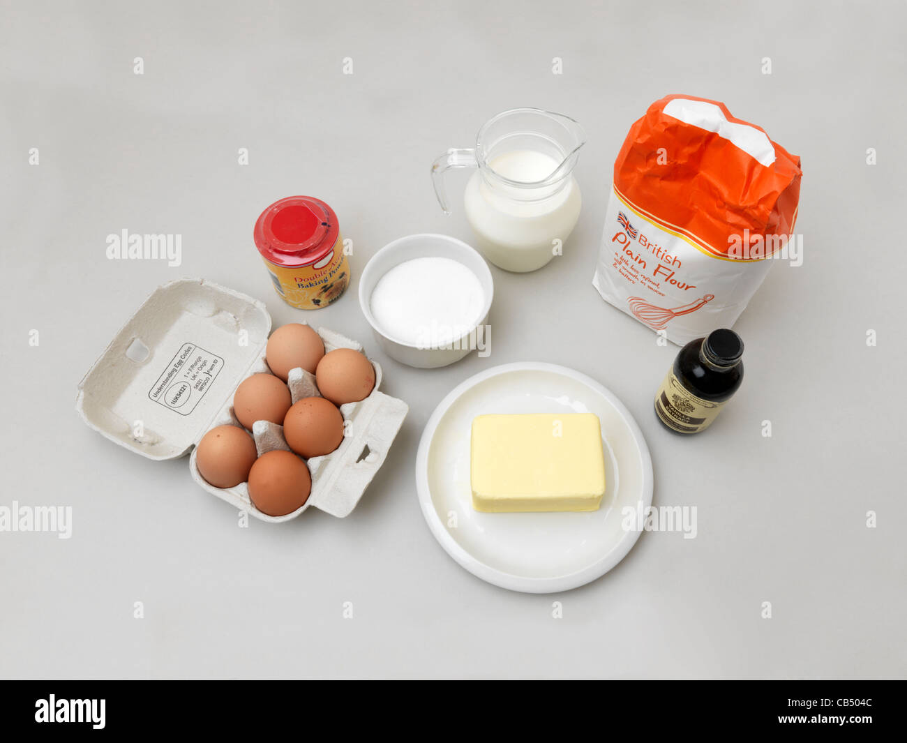 Ingredients Jug Of Milk, Plain Flour, Vanilla Extract, Bowl Of Sugar