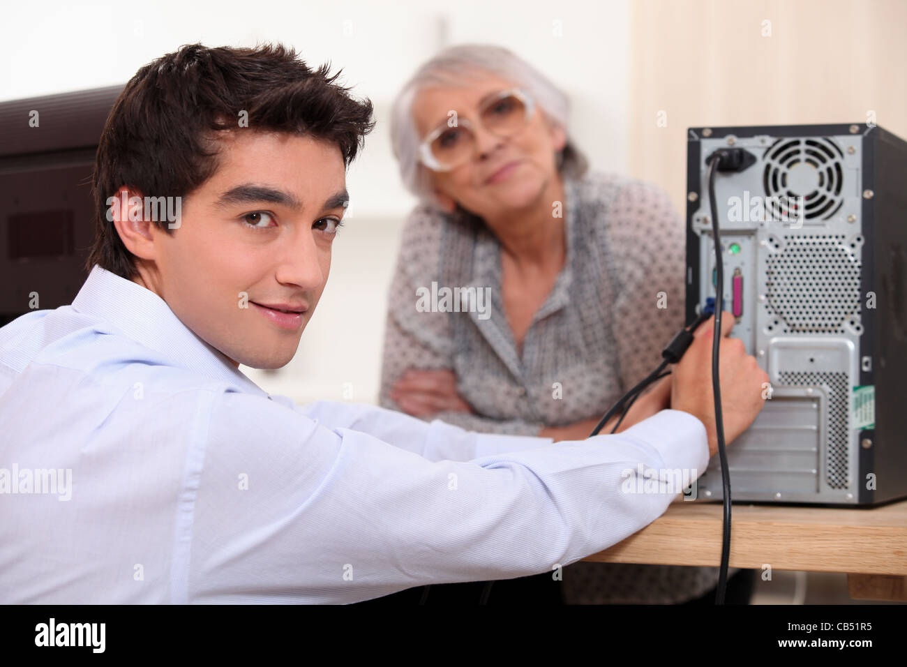 Grandson Setting Up Computer Stock Photo Alamy Grandson Setting Up Computer Stock Photo Alamy