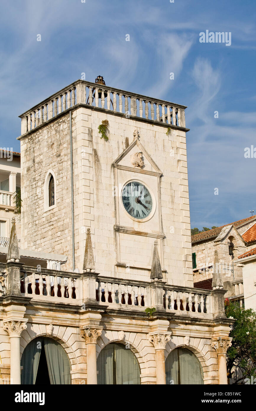 Clock on wall of tower in Trg Sveti Stjepana or St Stephens Square in Hvar Town, Hvar Island, Croatia Stock Photo