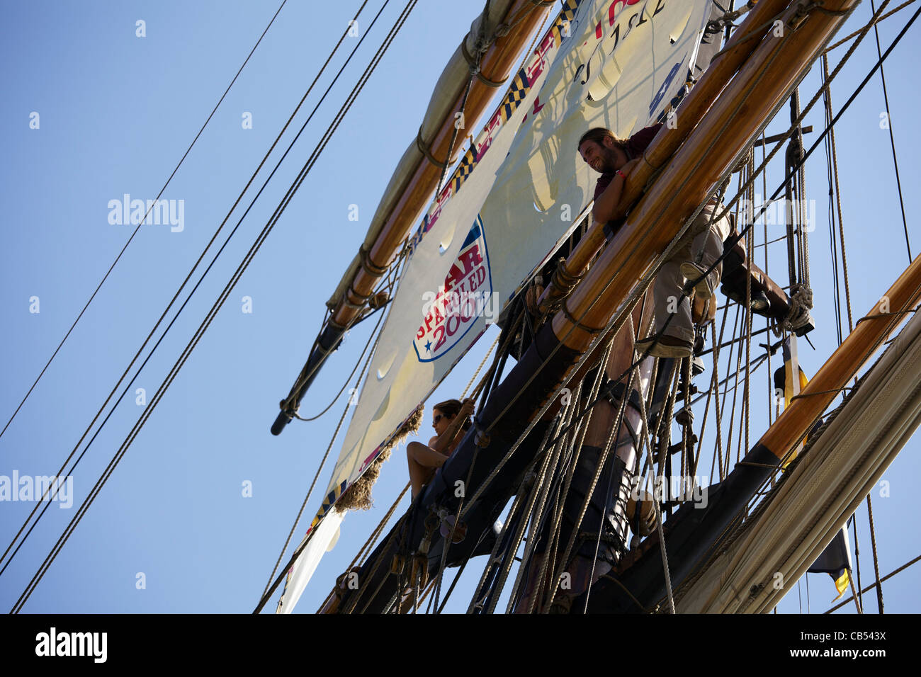 Manning the rigging on the Pride of Baltimore. Tall Ships 2011, Navy Pier, Chicago, Illinois. Stock Photo